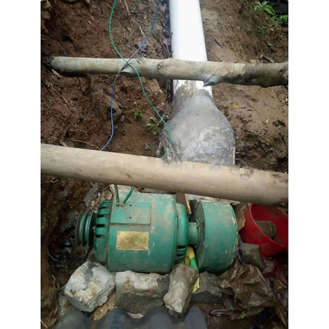 1000W Hydroelectric Water Turbine Generator 220V Off Grid Power System installed outdoors near river bank