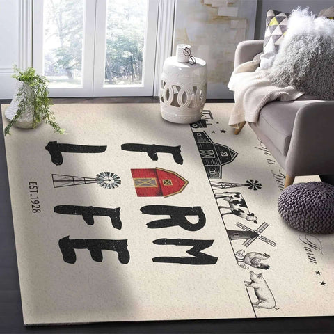 Farmhouse Living Room Rug 2.7 x 5 Feet Non Slip Machine Washable Floor Mat with barn and windmill design near a sofa