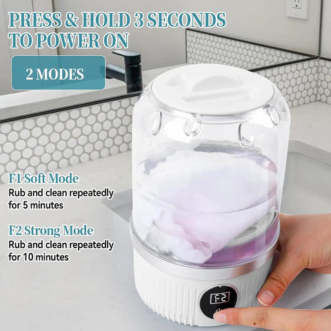 Portable Mini Washing Machine Cordless USB Rechargeable 15W Motor in F2 Strong Mode cleaning garments in water.