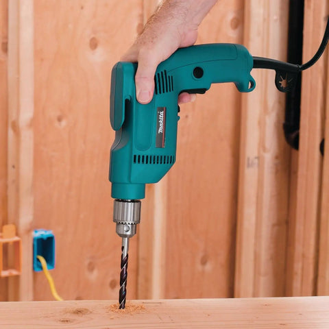 Three Eighths Inch Drill With 4.9 Amp Motor, Variable Speed 0 to 2500 RPM in use on wooden surface