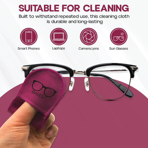 Front view of Basesit pink eyeglasses cleaning cloth, 4-pack; hand holding cloth next to black-rimmed glasses.