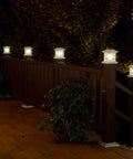 Solar Powered Outdoor Fence Lights RGB and Warm White for 3.6x3.6 to 5x5 Deck Posts illuminating a night deck scene.