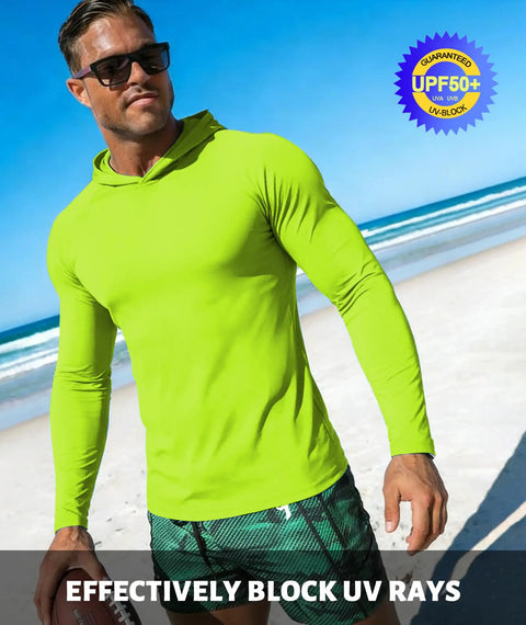 Man wearing neon green shirt from Three Pack Men's UPF Fifty Plus Hooded Sun Shirts, Long Sleeve UV Protection Rash Guard Set on the beach.