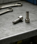 2 Pack Heavy Duty Steel Grease Tip Nozzles for Grease Guns on workshop table