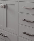 Top Shelf 96 Inch Gray Double Sink Bathroom Vanity With Durable Carrara Quartz Top And Undermount Porcelain Sinks Plus Flawless Brushed Nickel Hardware For Rapid Home Renovations close-up of gray cabinet doors and brushed nickel handles