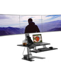 Avlt Electric Standing Desk Converter Fits Triple 32 Inch Monitors with motorized lift, adjustable height, 28.3 x 15.7 inch surface.