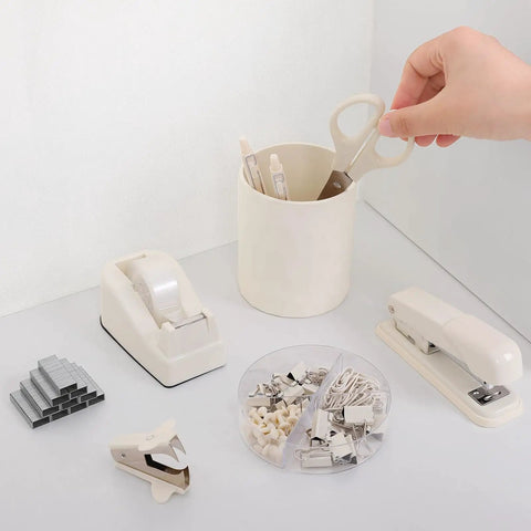 Must-Have All In One Desk Organizer Set For Home Office And School with stapler, tape dispenser, scissors, clips in beige.