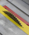 Top Shelf Zero Clearance Tape For Nail The Cut Precision And Crispy Clean Edges On Miter Or Table Saws with yellow PVC on saw.