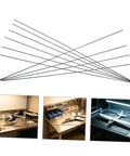 Pro Grade Carbon Fiber Rods Set Of Ten 2mm By 500mm for RC planes, ideal for wing spar reinforcement, shown with model planes.