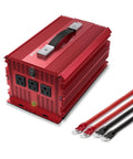 Heavy Duty 2000W Power Inverter DC To AC Converter With 3 AC Outlets, red metal housing and charging cables for camping use.