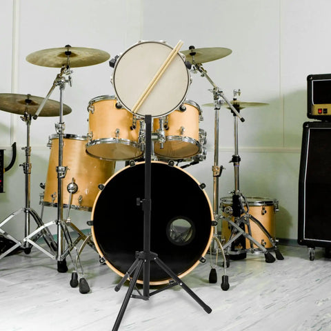 Tough As Nails Portable Drum Storage Rack Locks Your Snare And Mallets In Place With A Non Slip Base Designed To Save Space During Home Rehearsals Or Tour Life, featuring black alloy frame and snare drum.