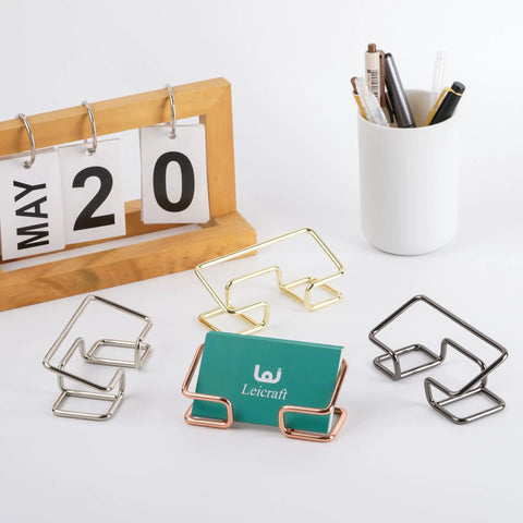 Metal Desk Card Holder For Office And Home, Large Capacity Card Organizer With Durable Gold Finish on a desk