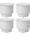 Image of a four-pack of white marine cup holders, part of the All Weather Boat Cup Holder Set With Drain Insert White Four Pack Durable Marine Plastic Drink Holders For Boats And Pontoon Easy Clean Spill Safe And Built Tough For Everyday Waterside Adventures.