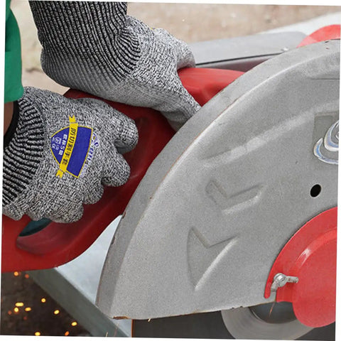 Person using Heavy Duty Cut Resistant Work Gloves Featuring Level 5 Soft Armor And Grippy Reinforced Palms, gripping a tool.