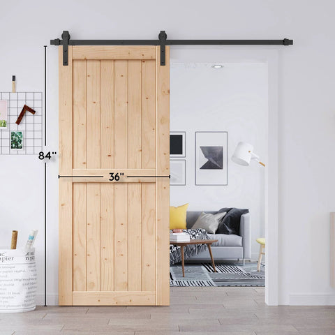 36 By 84 Inches Sliding Barn Door Solid Spruce Panelled Slab With H Frame For Interior Rooms And Storage Closets DIY Assembly And Easy Install Durable Rustic Farmhouse Wood Door Ideal For Small Spaces installed in a living room doorway