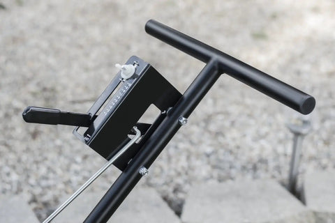 Close-up of handle and control panel of Pro Push Broadcast Spreader 85 Lb Capacity With Durable Plastic Hopper for lawn care.
