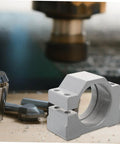 Aluminum CNC Spindle Motor Mounting Bracket Clamp For Carving Machines, shown with CNC bits on workbench.