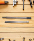 Replacement Jack Handle For Hydraulic And Bottle Jacks, Easy Lift Black Steel And Plastic Pole Lever on a wooden surface