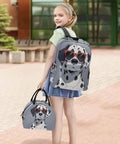 Child holding Dalmatian Print Backpack with Insulated Lunch Cooler, showing design and functionality outdoors.