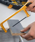 Using a hand saw from All In One 168 Piece Tool Set With Screwdrivers, Ratchet Wrenches, Socket Wrenches, Hand Saw, And Hammer