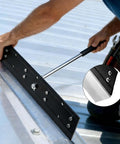 Man using 16 Inch Sheet Metal Folding Hemming Tool Heavy Duty Steel Hand Bender With Three Eighths Inch And One Inch Depths For HVAC Ductwork