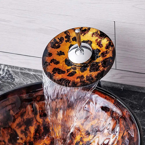 USZWBY Artistic Vessel Sink Bathroom Tempered Glass Vanity Sink, round bowl with waterfall chrome faucet pouring water