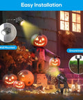 Landscape Spotlights With Sensor And 5 Lighting Modes illuminating Halloween decorations outdoors