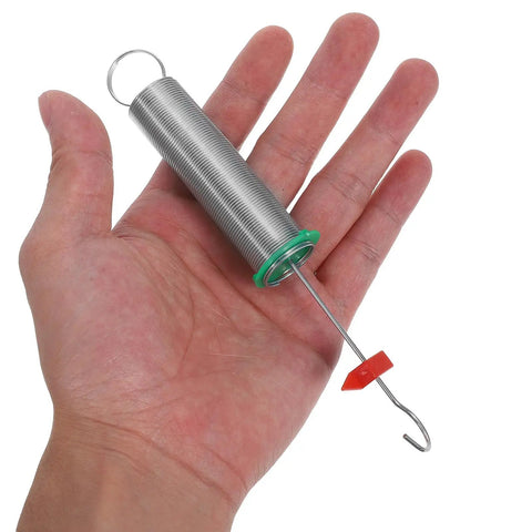Hand holding a steel coil from the 10 Pack Spiral Spring Kit for Physics Experiments Hooke's Law Teaching Tools Reliable Compression Springs Assortment