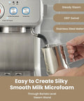 Dual Boiler Espresso Machine With Built In Grinder And 58mm Commercial Portafilter Barista Steam Wand 31 Grind Settings Stainless Steel Home Barista Ready Sterling Silver Finish showing steam wand in use for silky milk microfoam