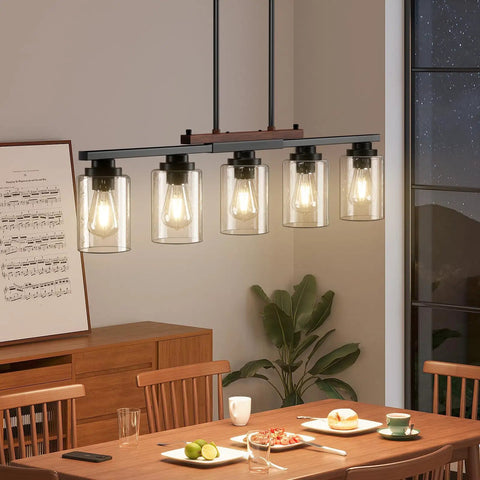 Straight Up Modern Farmhouse 5 Light Dining Room Chandelier With Dope Seeded Glass Shades Galvanized Steel Island Ceiling Fixture Lighting Top Shelf Kitchen Vibes over dining table with glowing lights.
