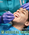 Dentist wearing Heavy Duty Nitrile Disposable Medical Exam Gloves Ice Blue 3.2 Mil Powder Free Latex Free 1000 Count Large