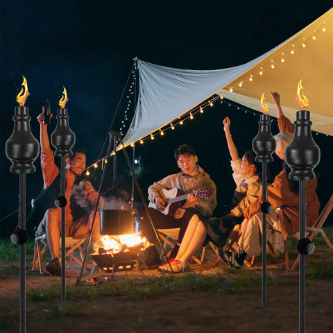 Six Pack Metal Citronella Torches For Outdoor Use 60 Inch Black Garden Yard Lights with people around campfire at night