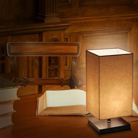 C7 S6 Mini LED Night Light Bulb 1.5W 15W Equivalent, E12 Candelabra Base, on a wooden table with an open book