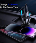 Heavy Duty iPhone Car Charger Featuring Coiled Lightning Cable And Extra Usb Dock MFi Certified Rapid Power Adapter For iPhone 15 14 13 12 11 Xr Xs Max 8 Plus iPad charging two devices simultaneously in vehicle console.