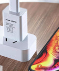 Best Bet 5V 1A USB Wall Charger Power Adapter For Kids Toys Smartwatches Bluetooth Headsets Webcams Routers And Small Smart Home Devices Fast Stable Charge In A Compact Wall Plug, white compact charger plugged into UK socket next to phone