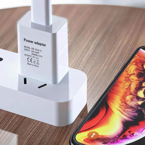 Best Bet 5V 1A USB Wall Charger Power Adapter For Kids Toys Smartwatches Bluetooth Headsets Webcams Routers And Small Smart Home Devices Fast Stable Charge In A Compact Wall Plug, white compact charger plugged into UK socket next to phone