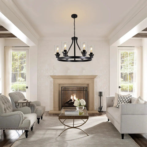 Six Light Farmhouse Wagon Wheel Chandelier for Dining Room with black metal and glass shades above a fireplace