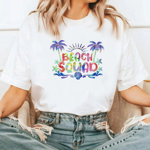 Tintnut Grungy Watercolor Heat Transfer Vinyl 12Pcs Iron On Glitter Sheets Neon Hues For Custom T Shirts And Fabric Projects Creative Crafts on white tee with 'Beach Squad' design.