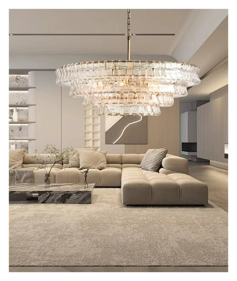 Next Level French Gray Glass Ceiling Pendant Light Sleek Round Chandelier With Dreamy Warm Ambiance in modern living room.