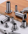 LMF25UU Linear Ball Bearing Set 26mm Bore And 40mm OD 58mm Length With Nickel Plated Round Flange And Screws On Wood Surface
