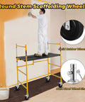 Tough As Nails 5 Inch Scaffolding Wheels Set Of Four Swivel Casters With One Inch Round Stem Dual Lock For Industrial Platform Towers 440 Pound Capacity Workhorse Rig showing worker on scaffold painting.