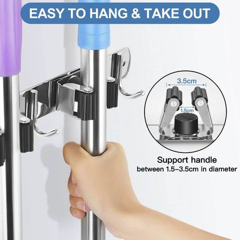 Stainless Steel Wall Mounted Broom And Mop Holder With Five Racks And Four Hooks Self Adhesive Heavy Duty Storage Organizer for easy hanging.