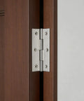 Close-up of 60 Pack Stainless Steel Cabinet Hinges Measuring Two Point Five Inches installed on a wooden door.