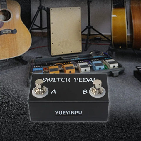 Momentary Dual Switches For Guitar Effect Pedal With TRS Cable in studio, aluminum shell, control for pedals and devices in background.