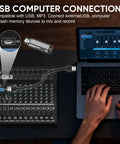 Person connecting laptop to 16 Channel Pro Audio Mixer For Live Sound And Studio DJ Performances With Bluetooth USB Recording 99 DSP Effects 48V Phantom Power Built In Reverb MP3 Player And Easy Karaoke Setup via USB