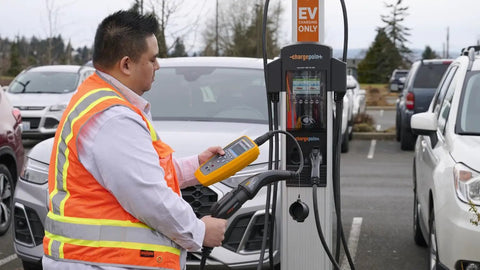 Heavy Duty Electric Vehicle Charging Station Analyzer With Type 1 Plug for Knockout AC Diagnostic Testing in use at a charging station.