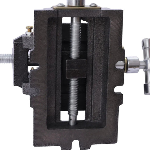 Close-up view of Tough As Nails Three Inch Drill Press XY Compound Vise showing cast iron base and precision screw mechanism.