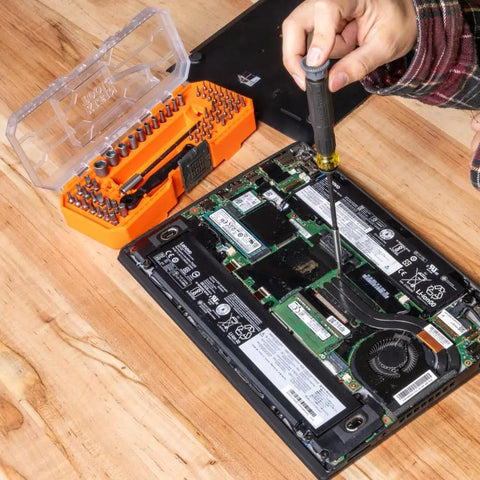 Using 64 Piece Micro Ratchet Bit Set With Low Profile Magnetic Driver And Modular Case on laptop repair