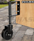Top Shelf 4 Inch Spring Loaded Gate Caster Wheel With Side Brake And 360 Degree Swivel For Outdoor Wooden Fence Gates Heavy Duty Rig Built Like A Tank To Roll Smooth Over Bumps Black Pair, close-up view of caster attached to a wooden fence.
