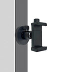 Heavy Duty Rugged Magnetic Phone Mount Holder With Hella Strong 50 Lbs Pull Force Magnet Clamp on a metal panel, ideal for workouts.